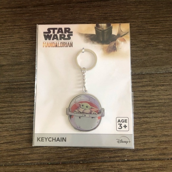 Star Wars: The Mandalorian: Grogu in carrier keychain - Picture 1 of 3